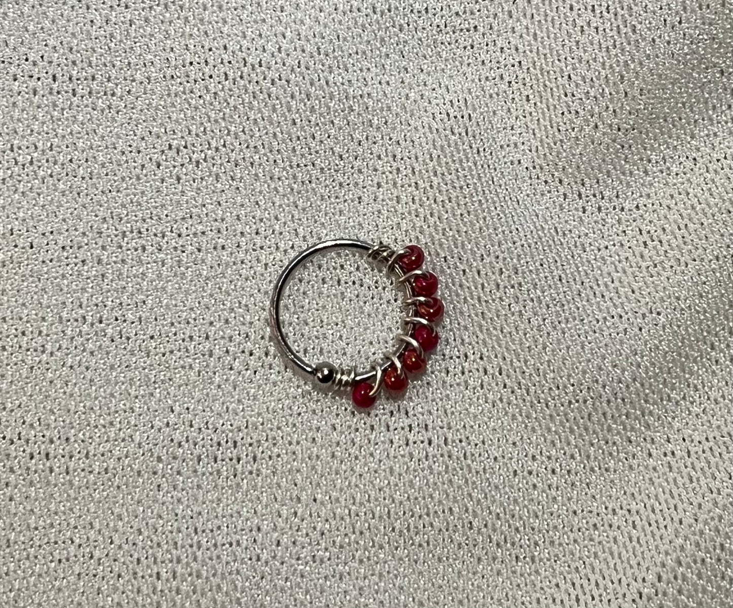 PIERCING SILVER ROJO